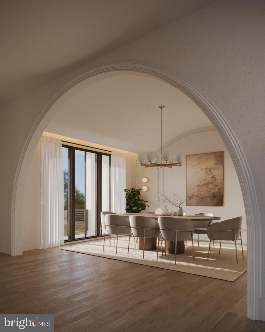 Rendering of the barrel-vaulted dining room with paneled walls and eight upholstered chairs