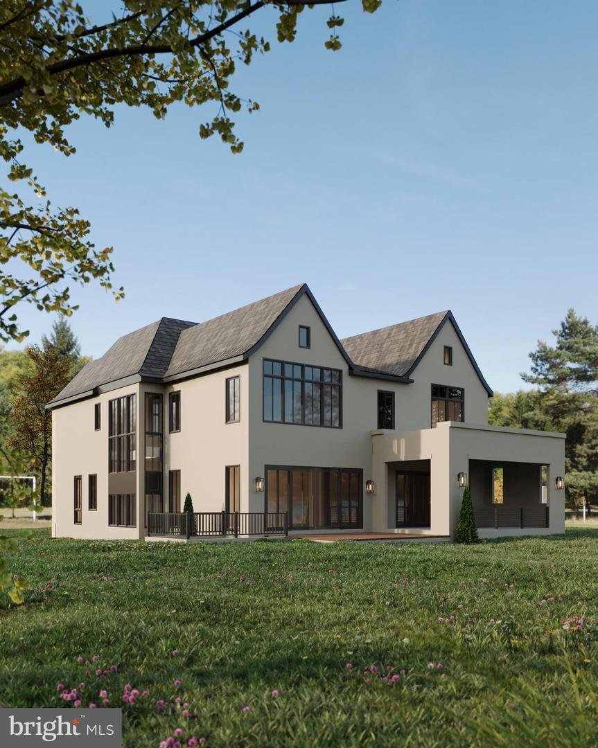 Rendering of the rear elevation with a covered outdoor living room, deck, and lawn